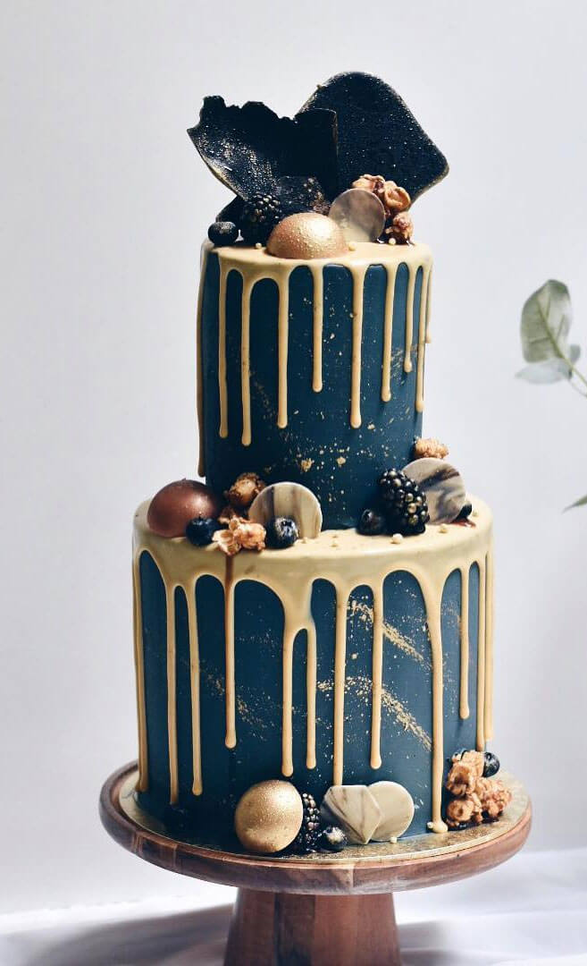 Navy & gold drip wedding cake