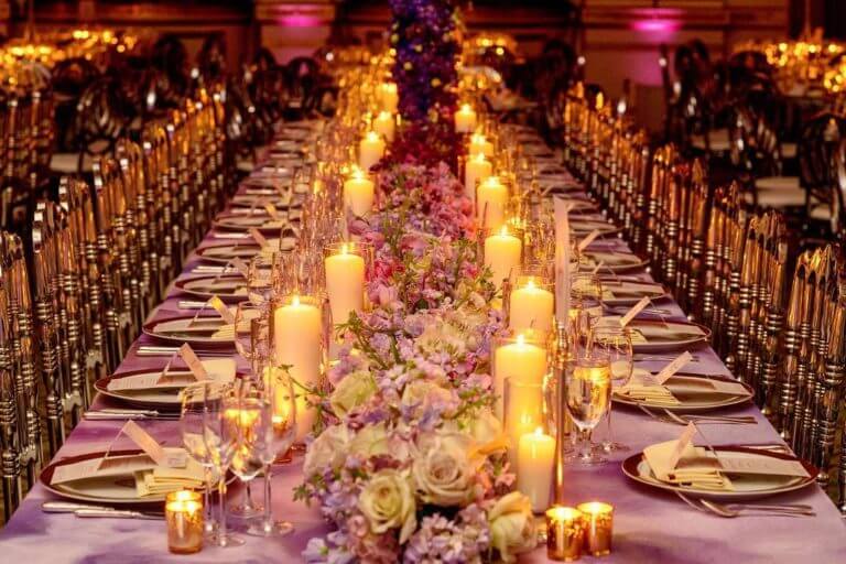 Purple centrepiece & candle wedding tablescape