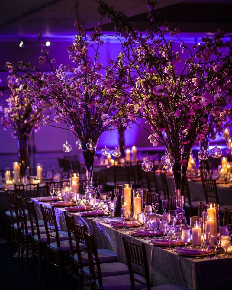 Tall purple centrepieces with glass baubles