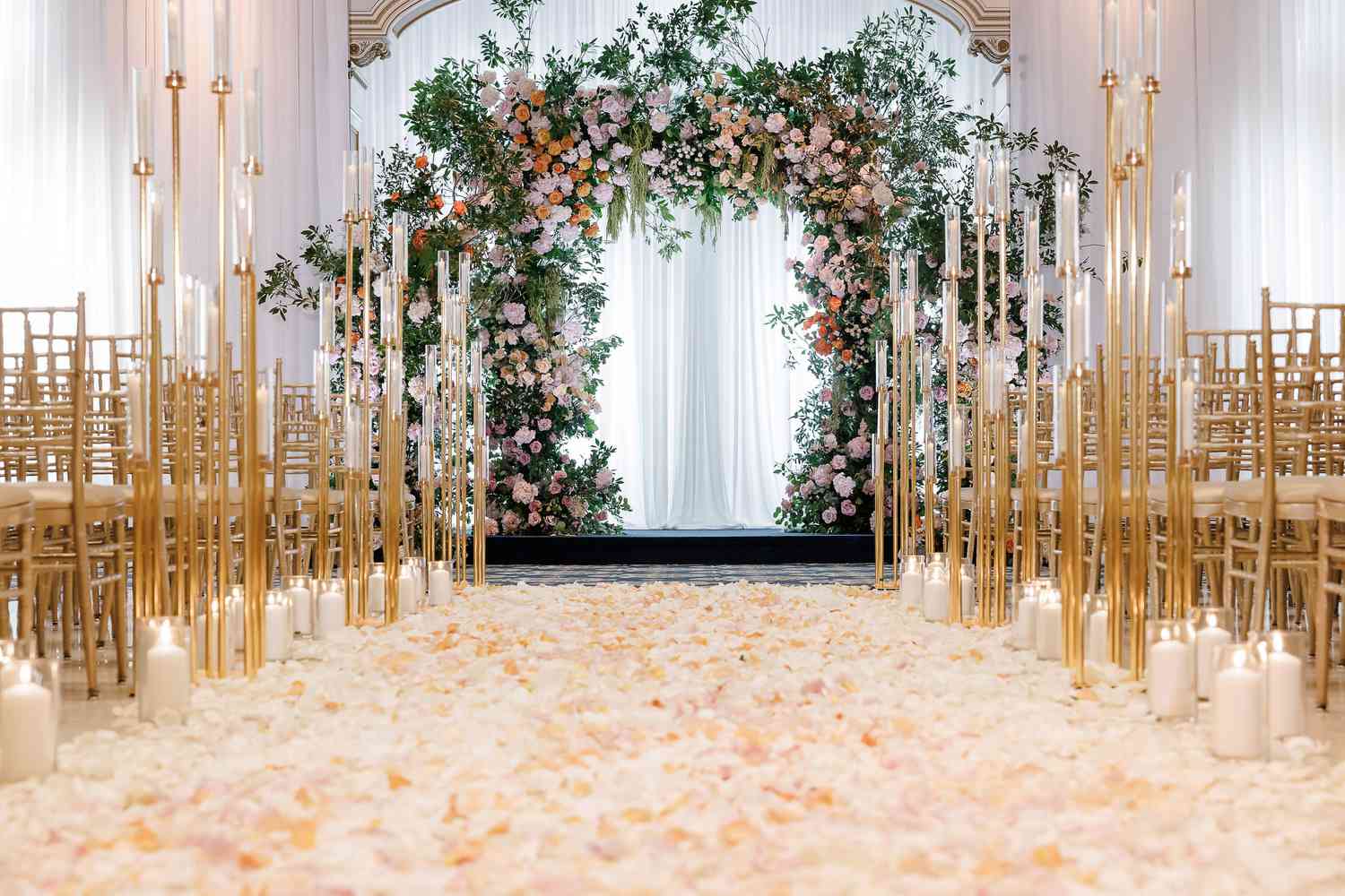 Fairytale wedding arch and petal aisle